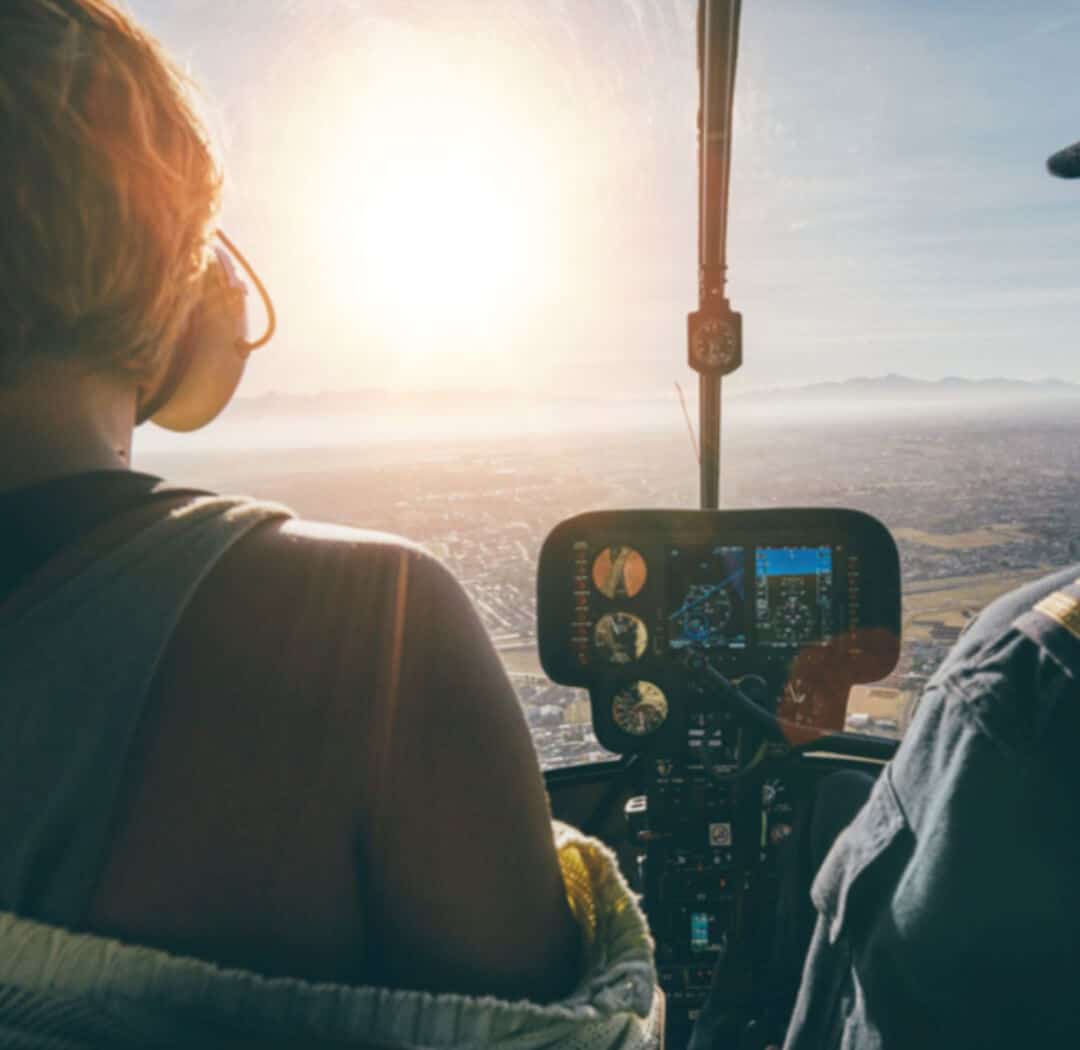 Man watching outside from the helicopter