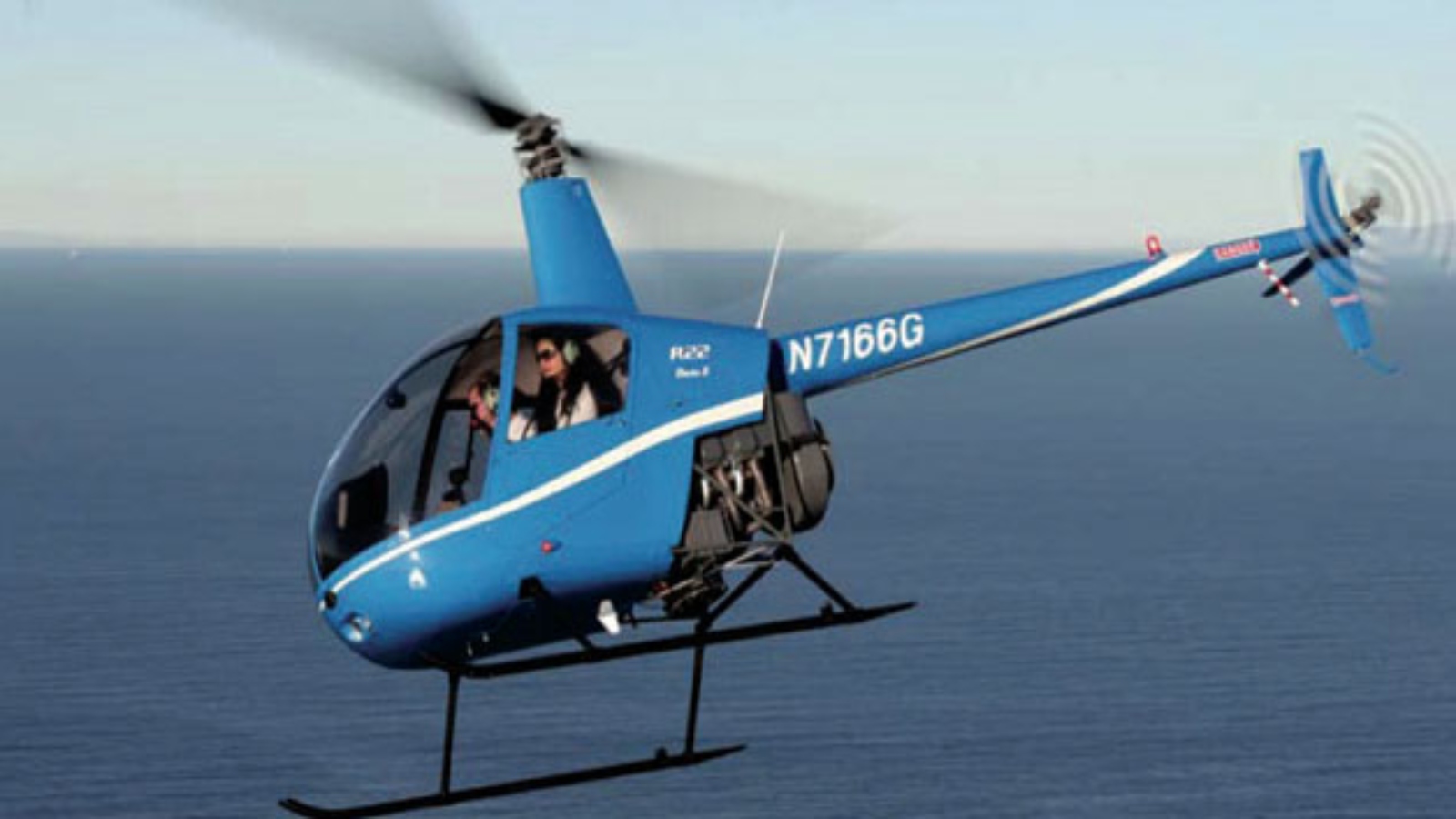 Robinson R22 in flight over Sarasota